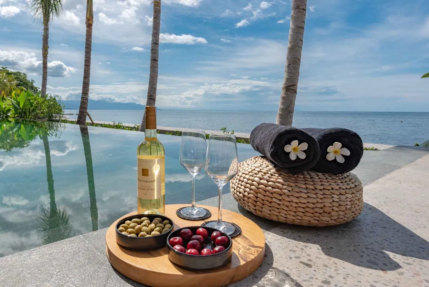 Poolside, wine and olives
