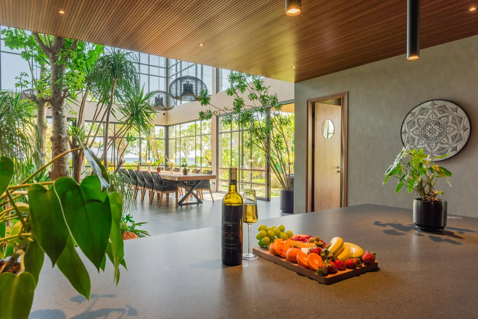 The kitchen galley, timber cabinets and wine fridge