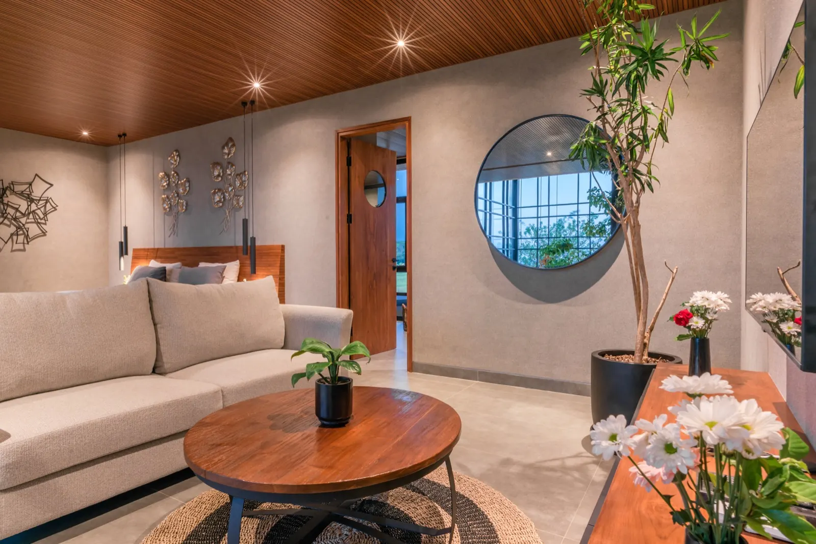 A suite open to its terrace at night