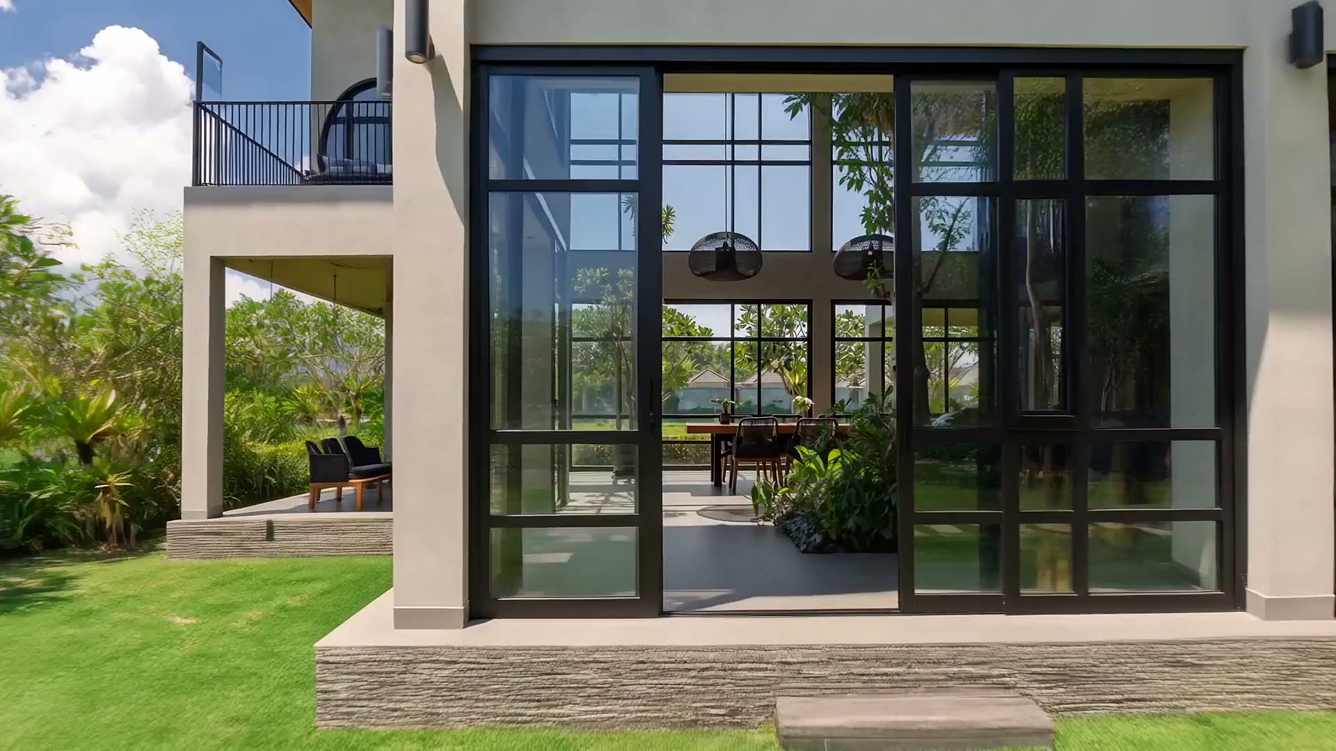 The Pool Villa glass corner from the lawn